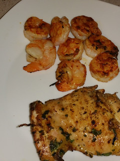 A picture of Cilantro lime chicken with grilled shrimp.