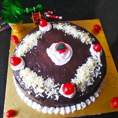 A picture of Dark chocolate ganache cake.