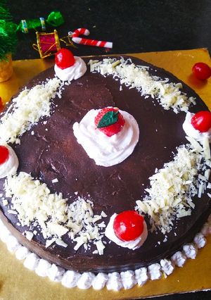 A picture of Dark chocolate ganache cake.
