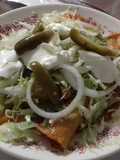 Enchiladas de flor de jamaica guisada a lo ranchero