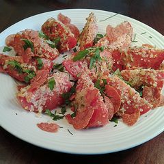 A picture of Crispy Topped Roasted Tomatoe Wedges.