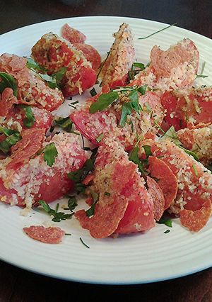 A picture of Crispy Topped Roasted Tomatoe Wedges.
