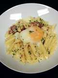 Penne' Pasta with back bacon white sauce and poached egg