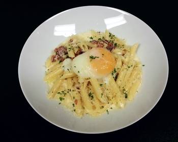 Unique Recipe Penne Pasta with back bacon white sauce and poached egg Restaurant Style