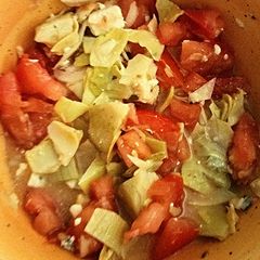 A picture of Tomato Artichoke Salad.
