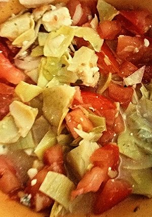 A picture of Tomato Artichoke Salad.