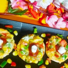 A picture of Vegetables and Corn baby Pizza.