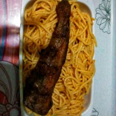 Onion spaghetti and fried fish A picture of Onion spaghetti and fried fish.