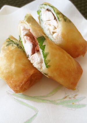 A picture of Spring Rolls Made with Chicken Tenderloins, Umeboshi (Pickled Plum) and Shiso Leaves.
