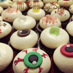 A picture of an eye for an eye red velvet cupcakes.