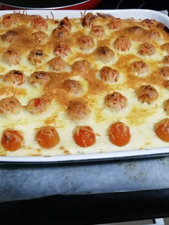 Una foto de Pastel de puré de patatas con tomate cherry