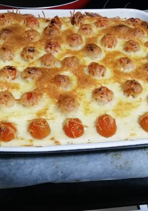 Una foto de Pastel de puré de patatas con tomate cherry