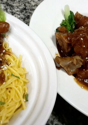 A picture of Kanya's Braised Pork Knuckles with BBQ sauce.