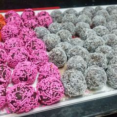 A picture of Oreo balls with coconut coating.
