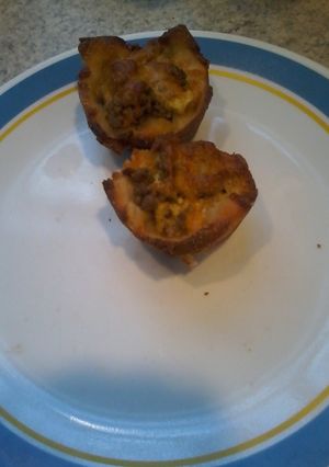 A picture of Pizza dough cups.