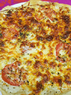 Una foto de Pizza carbonara
