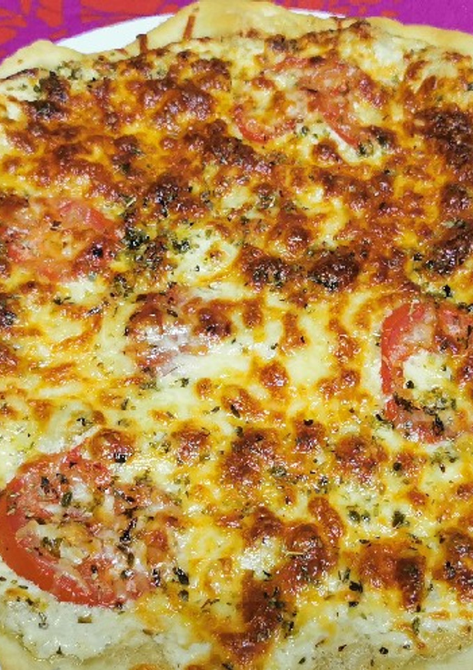Una foto de Pizza carbonara
