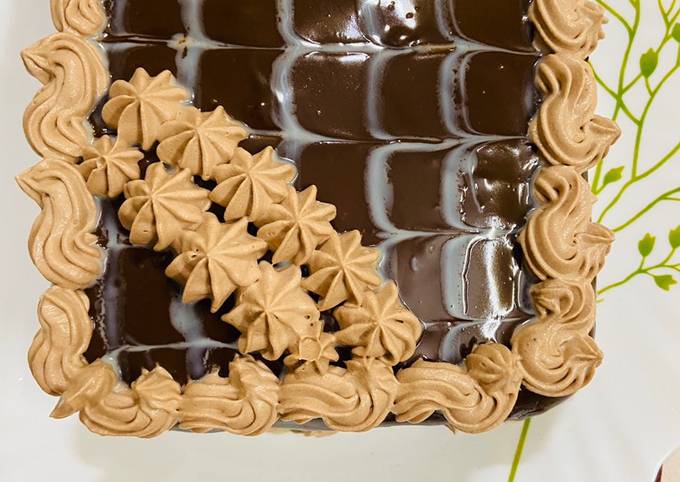Biscuit cake with ganache frosting