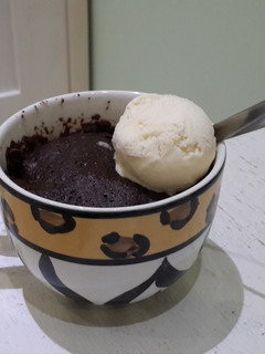 A picture of Brownie in a mug.