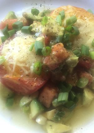 A picture of Eggs in Roasted Roma Tomatoes.
