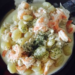 A picture of Seafood Gnocchi With White Wine Parmesan Sauce.