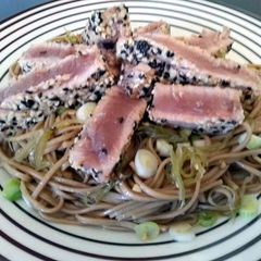 A picture of Pan Seared Tuna Steak with Seaweed Salad and Soba Noodles.