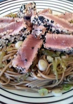 A picture of Pan Seared Tuna Steak with Seaweed Salad and Soba Noodles.