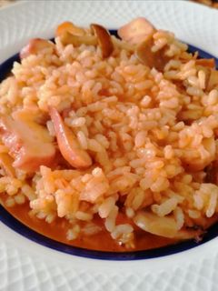 Una foto de Arroz tierra y mar