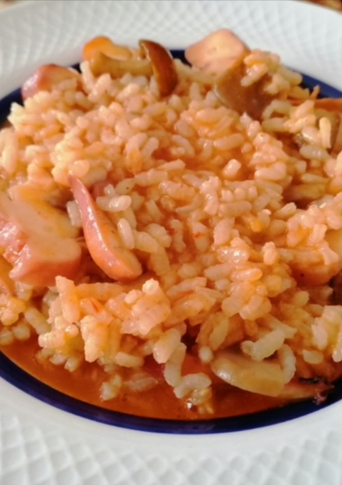 Una foto de Arroz tierra y mar