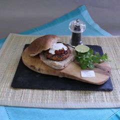 A picture of Mexican Bean Burgers with a Lime Yoghurt.