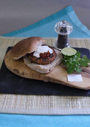 A picture of Mexican Bean Burgers with a Lime Yoghurt.