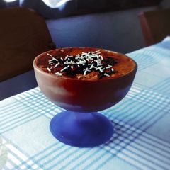 A picture of Chocolate Mousse Layered with Crushed Cookies.