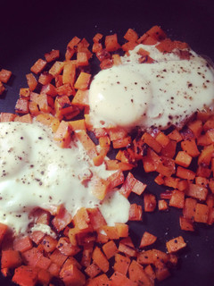 A picture of Sweet potato hashbrowns And eggs.