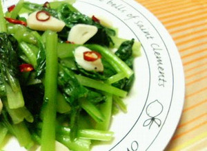 A picture of Komatsuna Greens Stir-Fried with Garlic and Salt.