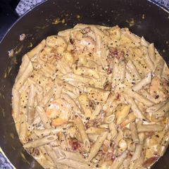 A picture of Chicken And Shrimp, Sun Dried Tomato Pasta.