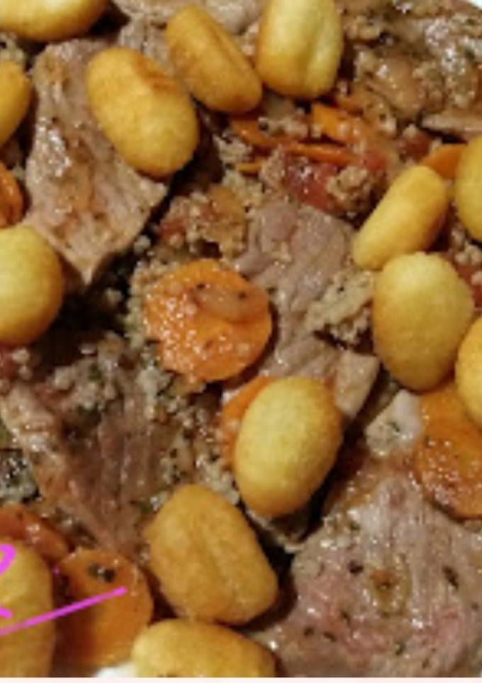 Una foto de Secreto ibérico en salsa con quinoa