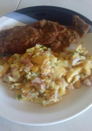 Una foto de Revuelto gramajo con milanesa