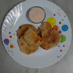 A picture of Sweet Kachori with Spicy Dip.