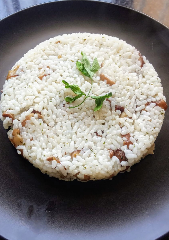 Una foto de Pastel de arroz con shiitake
