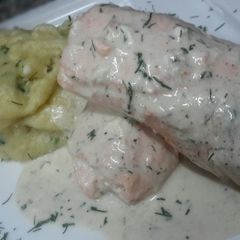 A picture of Kanya's Poached Salmon in White wine Cream Sauce.
