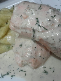 A picture of Kanya's Poached Salmon in White wine Cream Sauce.