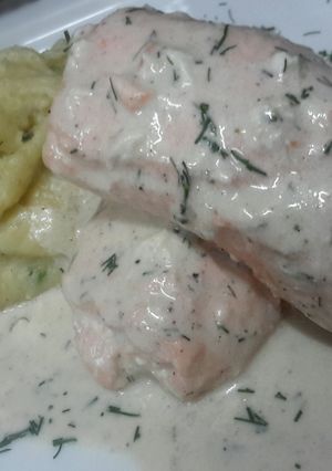 A picture of Kanya's Poached Salmon in White wine Cream Sauce.