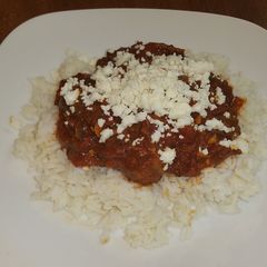 A picture of Puerco Con Chile Rojo Con Arroz.