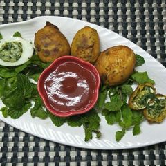 A picture of Egg spinach Bonda.