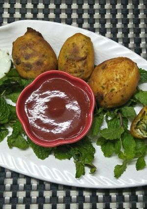 A picture of Egg spinach Bonda.