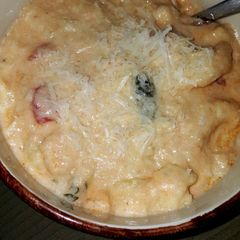 A picture of Cheese tortellini and Italian sausage soup.