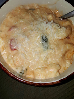 A picture of Cheese tortellini and Italian sausage soup.