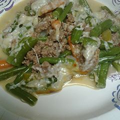 A picture of Ground beef and green bean casserole.