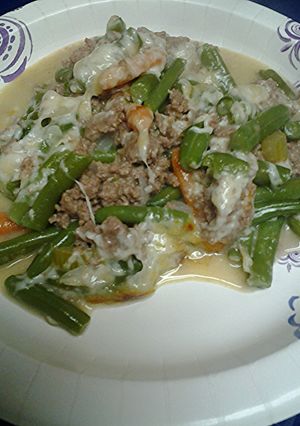 A picture of Ground beef and green bean casserole.