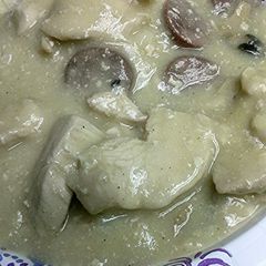 A picture of Sausage chicken and mushroom gravy.